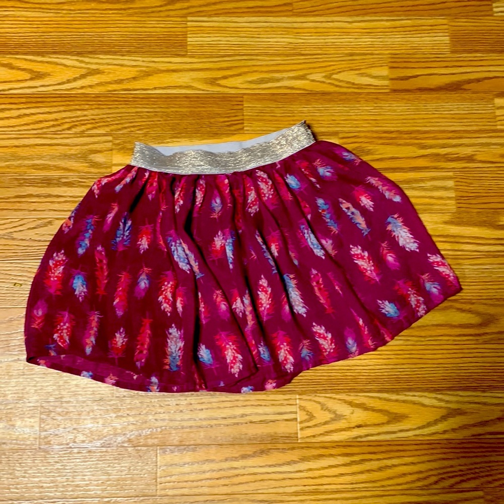 Pink skirt with feathers